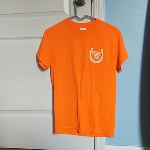 "Lee County Cracker day Rodeo"Orange and white tee